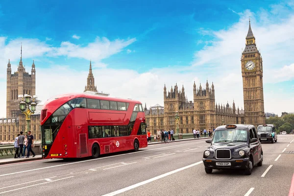 Big Ben, Westminster Bridge, červený autobus — Stock fotografie