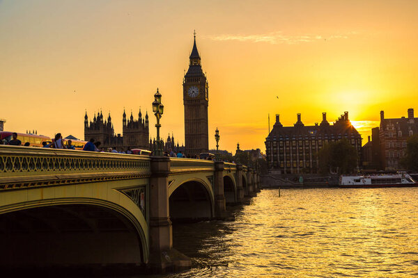 The Big Ben, the Houses of Parliament and Westminster bridge in beautiful summer evening, London, England, United Kingdom