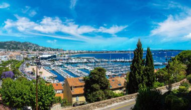 Panoramic view of port in Cannes clipart