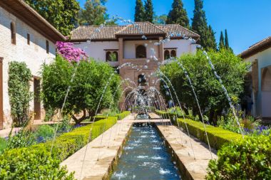 Fountain and gardens in Alhambra palace clipart