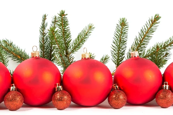 Christmas balls and fir branches — Stock Photo, Image