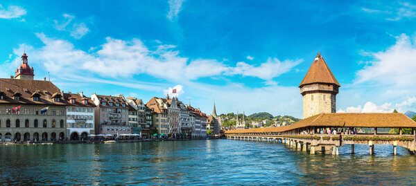 Panorama of Famous Chapel bridge in Lucerne in a beautiful summer day, Switzerland