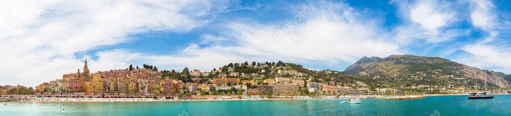 Panorama of Colorful old town and beach in Menton on french Riviera in a beautiful summer day, France