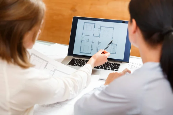 Designers work on a blueprint of new apartments — Stock Photo, Image