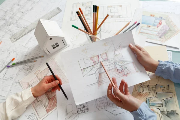 Discussion of interior hand drawings — Stock Photo, Image