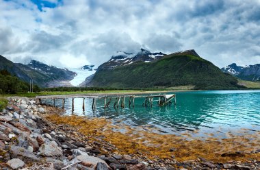 Glacier on the viewing platform. Svartisen Glacier in Norway. clipart