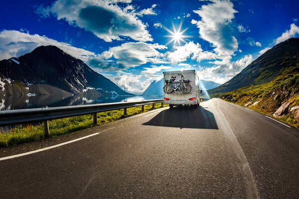 Caravan car travels on the highway.