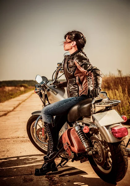 Biker girl on a motorcycle — Stock Photo, Image