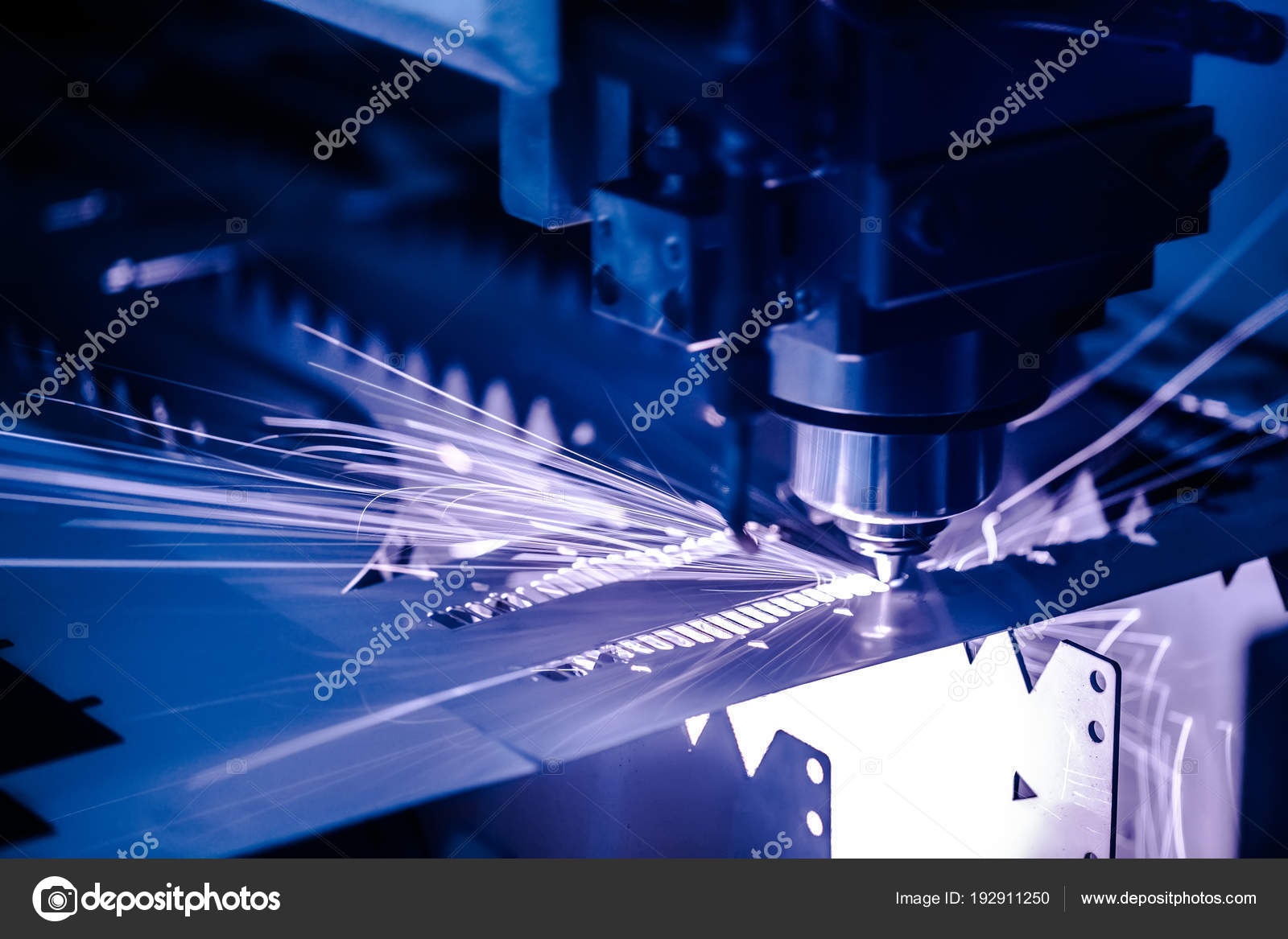 CNC Laser cutting of metal, modern industrial technology. Stock Photo