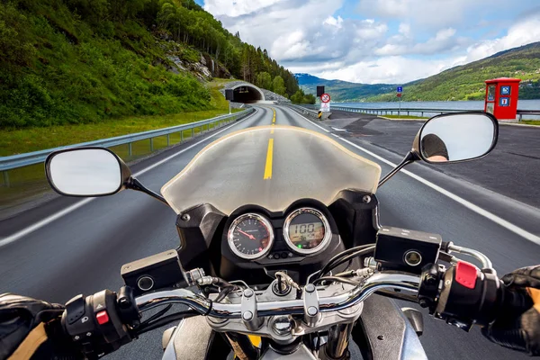 Biker First-person view in Norway The entrance to the tunnel. — Stock Photo, Image