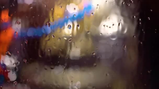 Window with raindrops and wet snow — Stock Video