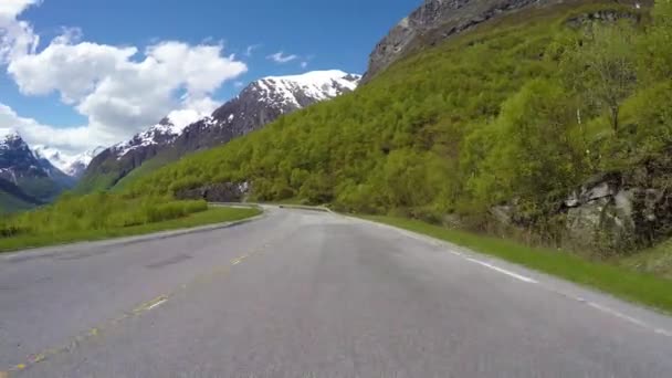 Driving a car on a serpentine road in Norway — Stock Video