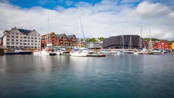 View of a marina in Tromso, North Norway timelapse. Tromso is considered the northernmost city in the world with a population above 50,000. — Stock Footage View of a marina in Tromso, North Norway timelapse. Tromso is considered the northernmost city in the world with a population above 50,000. Video Clip