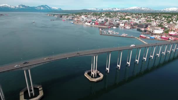 Aerial footage from Bridge of city Tromso, Norway aerial photography. Tromso is considered the northernmost city in the world with a population above 50,000. — Stock Footage Aerial footage from Bridge of city Tromso, Norway aerial photography. Tromso is considered the northernmost city in the world with a population above 50,000. Royalty Free Stock Video