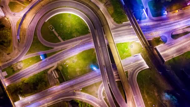 Night Timelapse Aerial view of a freeway intersection traffic trails in night Moscow — Stock Video