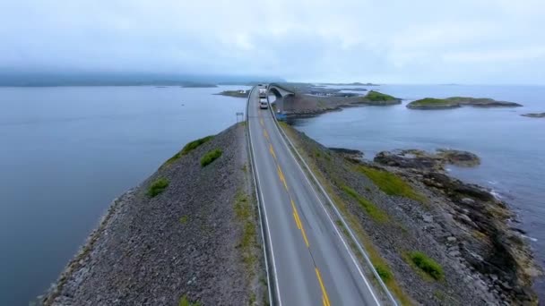 Aerial view Atlantic Ocean Road or the Atlantic Road (Atlanterhavsveien) been awarded the title as (Norwegian Construction of the Century). The road classified as a National Tourist Route. — Stock Video