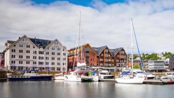 View of a marina in Tromso, North Norway timelapse. Tromso is considered the northernmost city in the world with a population above 50,000. — Stock Footage View of a marina in Tromso, North Norway timelapse. Tromso is considered the northernmost city in the world with a population above 50,000. Stock Footage