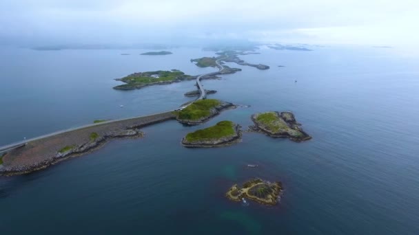 Aerial view Atlantic Ocean Road or the Atlantic Road (Atlanterhavsveien) been awarded the title as (Norwegian Construction of the Century). The road classified as a National Tourist Route. — Stock Video