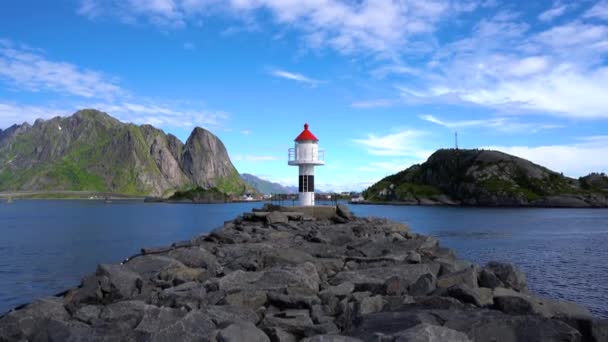 Lofoten is an archipelago in the county of Nordland, Norway. Is known for a distinctive scenery with dramatic mountains and peaks, open sea and sheltered bays, beaches and untouched lands. — Stock Video