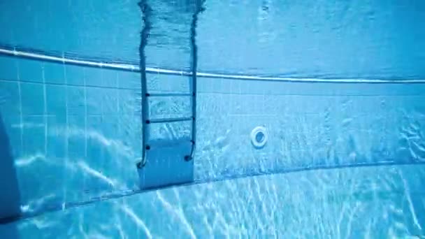 Ladder pool Swimming pool underwater background. — Stock Video