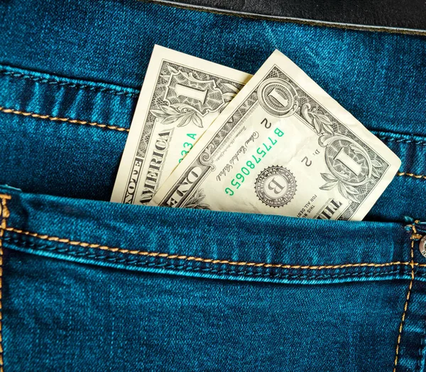 Kieszeni jeansów pieniądze dolarów — Zdjęcie stockowe