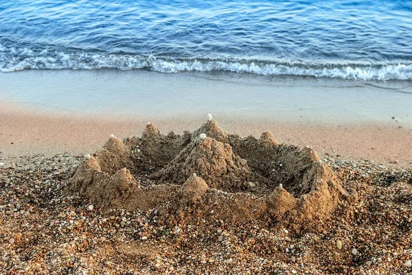 Sabbia castello spiaggia onda — Foto Stock