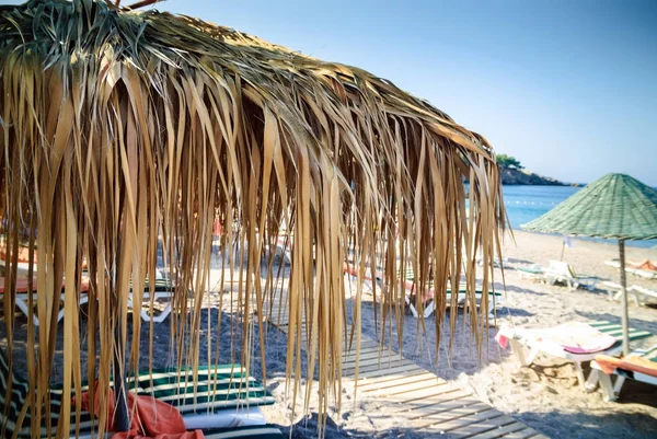 Guarda-chuva cena praia — Fotografia de Stock