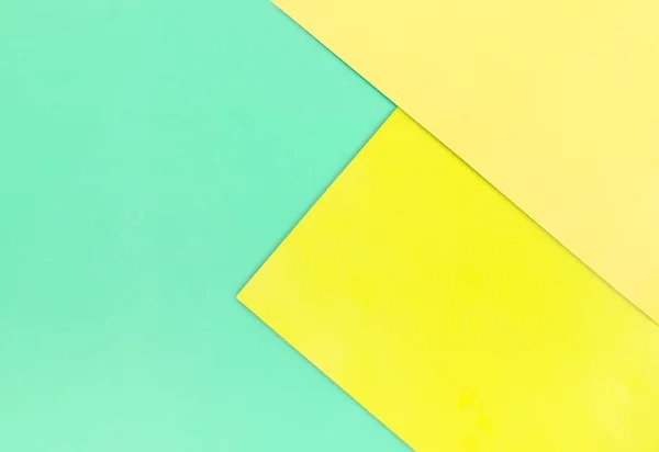 Farve papir baggrund. Pasteltone - blå, gul, gylden - Stock-foto