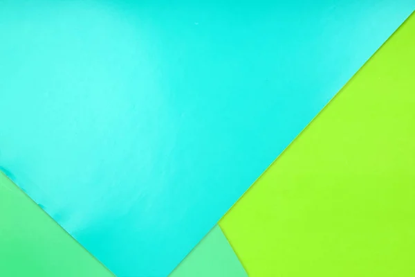 Farve papir baggrund. Tre pastelfarver - blå, gul, grøn - Stock-foto