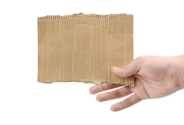 Mão feminina segurando um pedaço de papelão isolado — Fotografia de Stock