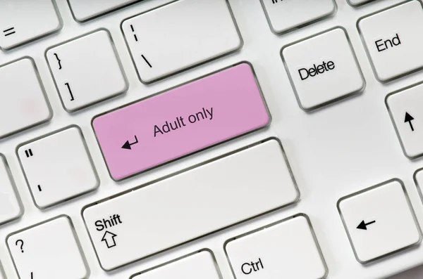 Adult only pink key button Online sex concept — 스톡 사진