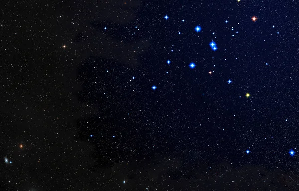 Perfekter Sternenhintergrund mit großen blauen und bunten Sternen — Stockfoto