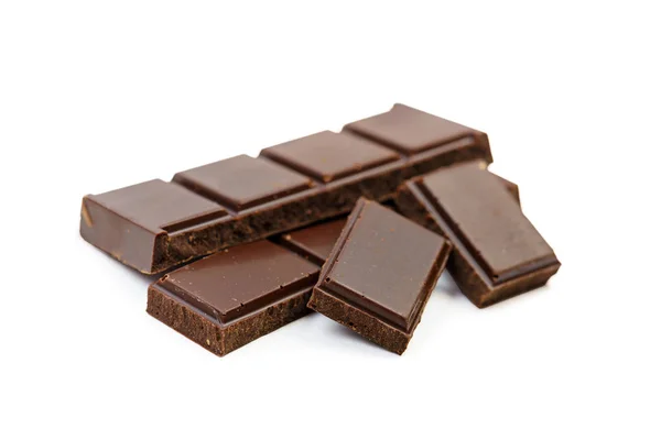 Шматочки шоколаду ізольовані відсічним контуром — стокове фото