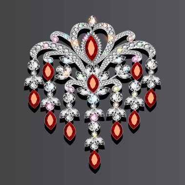 Resimde broş ile değerli taşlar.