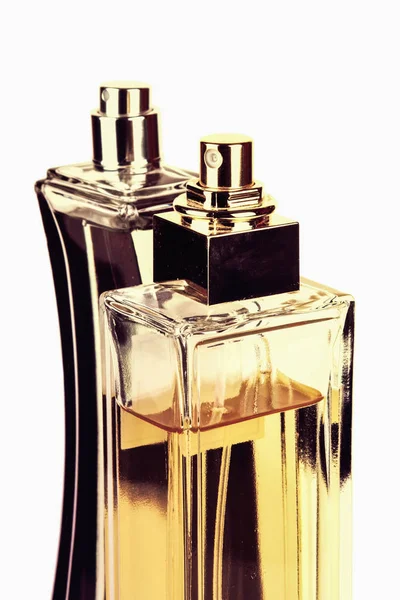 Dos frascos de perfume aislados en blanco — Foto de Stock
