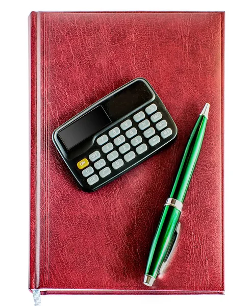 Caderno, caneta e calculadora de cima — Fotografia de Stock