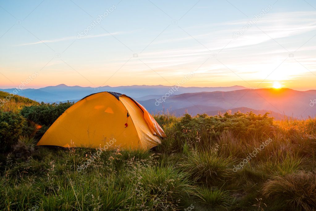Mountain tent, sunrise on the ridge, tracking