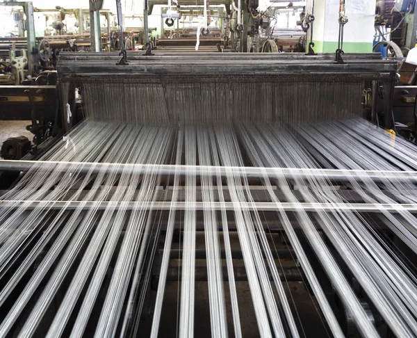 Old loom in a silk factory, close-up