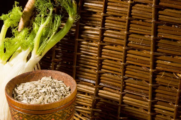 Fennel seeds in a wooden bowl — Stock Photo, Image