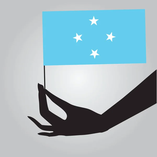 Hand med flagga Mikronesien — Stock vektor