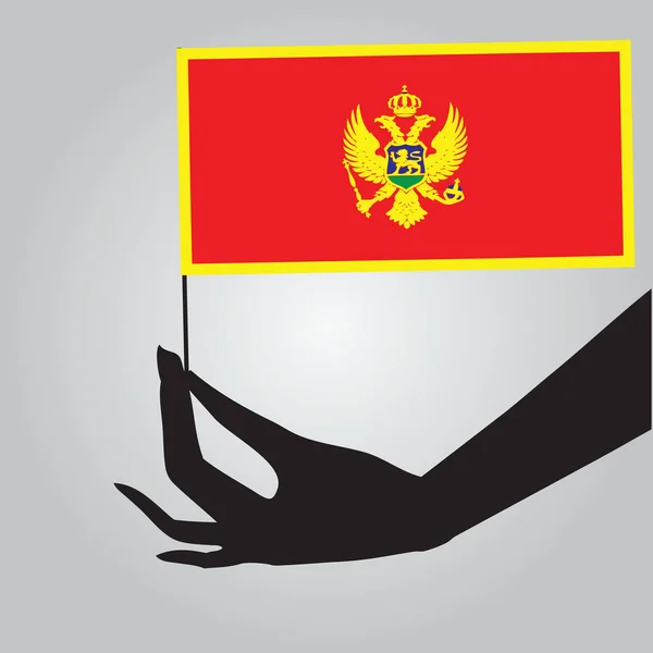 Hand mit Flagge Montenegro — Stockvektor