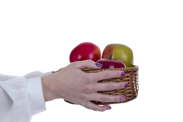 Fruit basket in the hands of — Stock Photo, Image