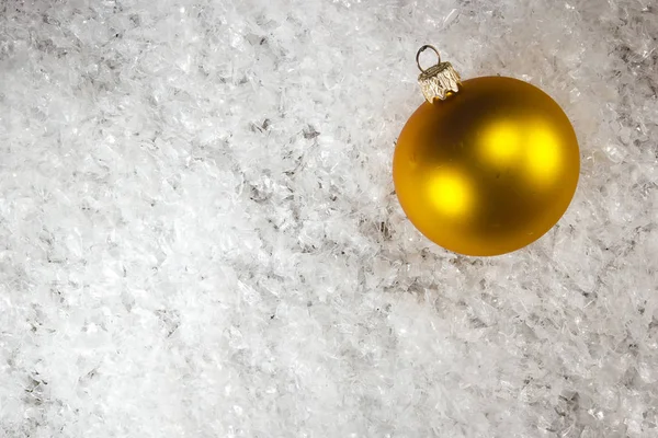 Christmas ball in the snow — Stock Photo, Image