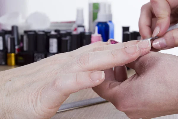 Manicure procedure in beauty salon — Stock Photo, Image