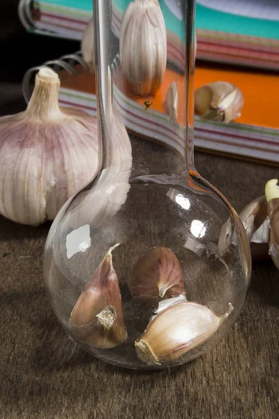 Laboratory Glassware and garlic — Stock Photo, Image