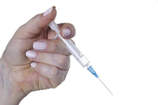 Female hand with syringe — Stock Photo, Image