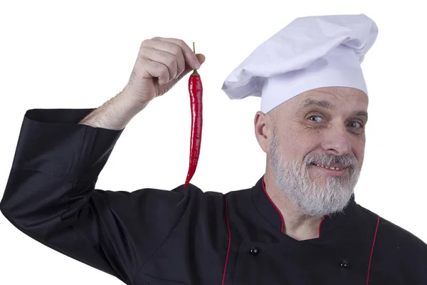 Bearded Chef holding hot chilli peppers — Stock Photo, Image