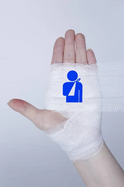 Bandage em uma mão — Fotografia de Stock