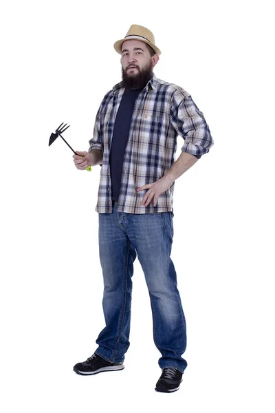Бородатий чоловік з садовими інструментами — стокове фото