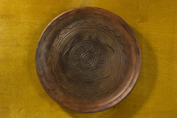 Clay dish with a pattern — Stock Photo, Image